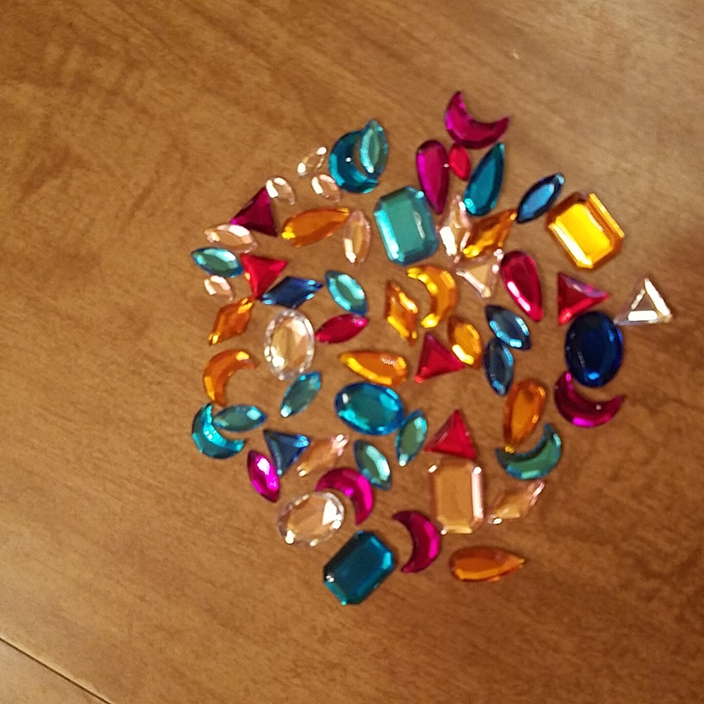 Colorful, acrylic stones for crafts.  Bright colors and assorted shapes.
